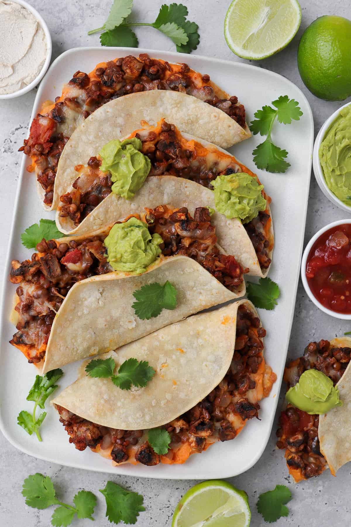 Tacos on platter.