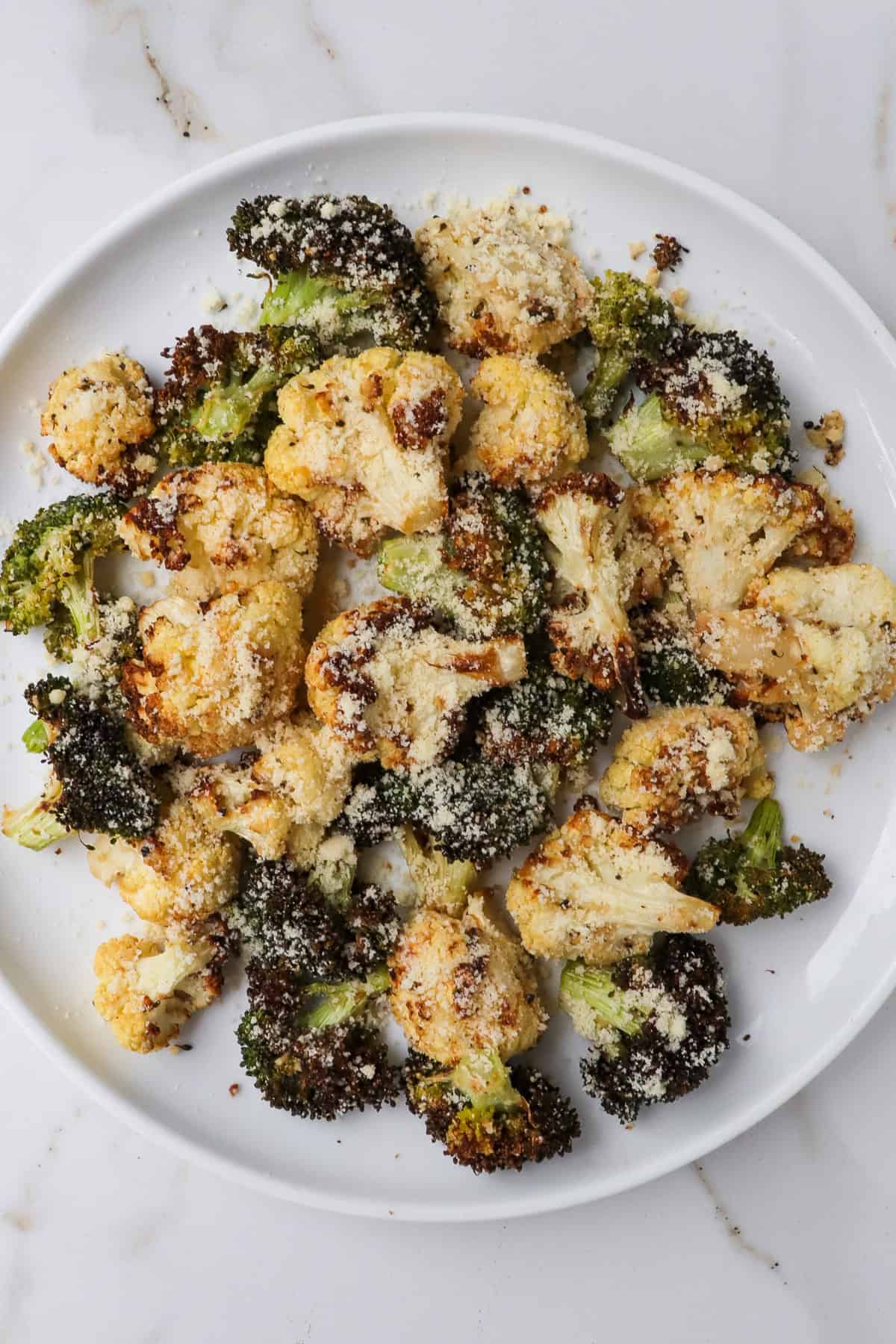 Crispy cauliflower and broccoli on a plate.