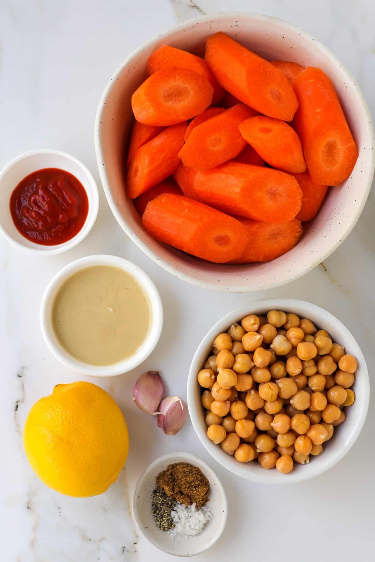 Ingredients to make carrot smirch hummus.