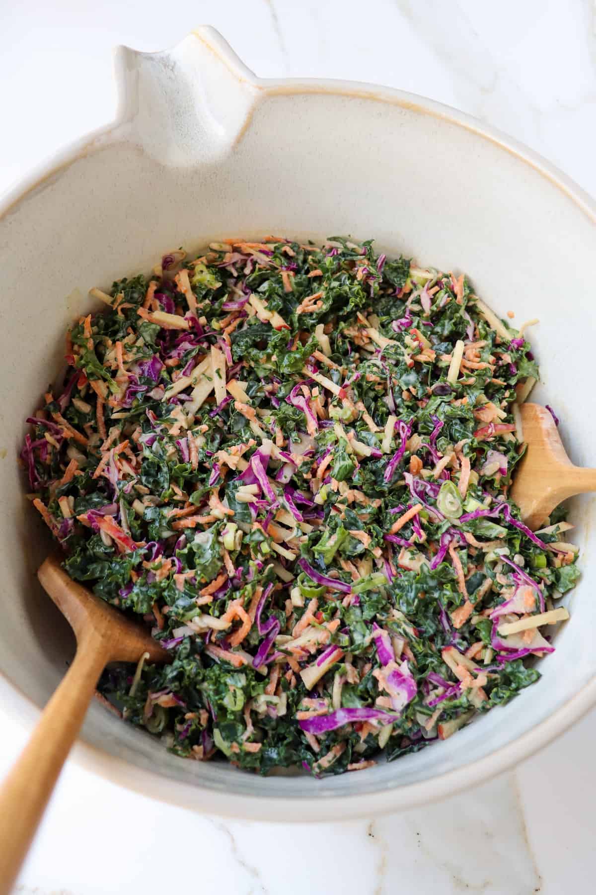 Kale slaw in a mixing bowl.