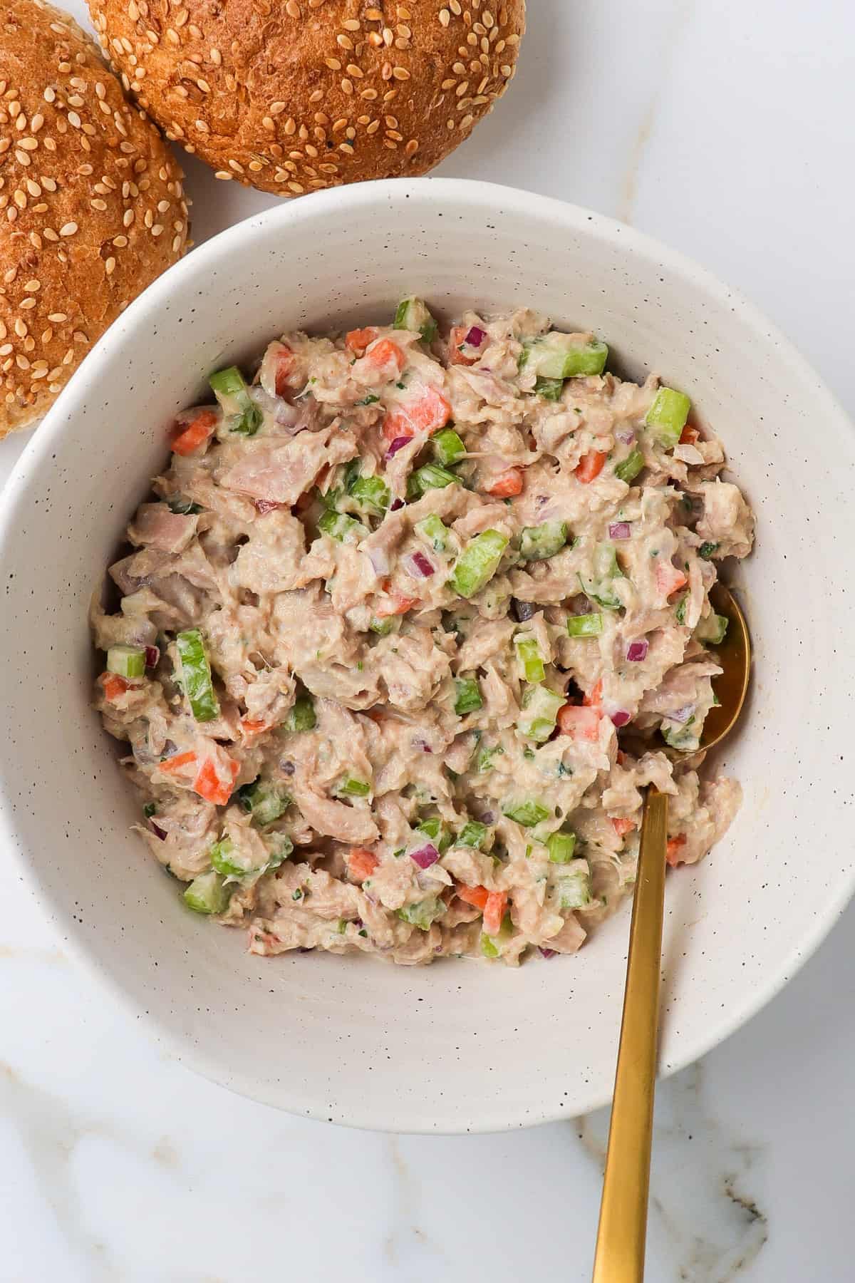 Tuna salad in mixing bowl.