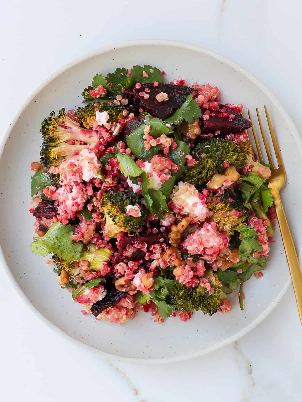 Beetroot and broccoli salad on a plate.