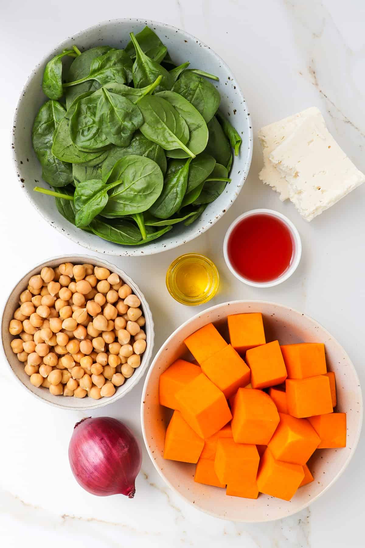 Ingredients needed to make a chickpea pumpkin salad.