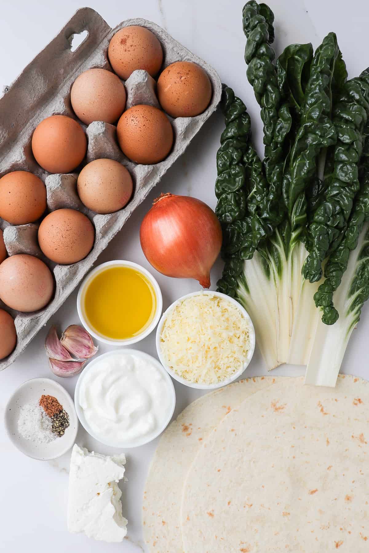 Ingredients shown to make a silverbeet quiche.