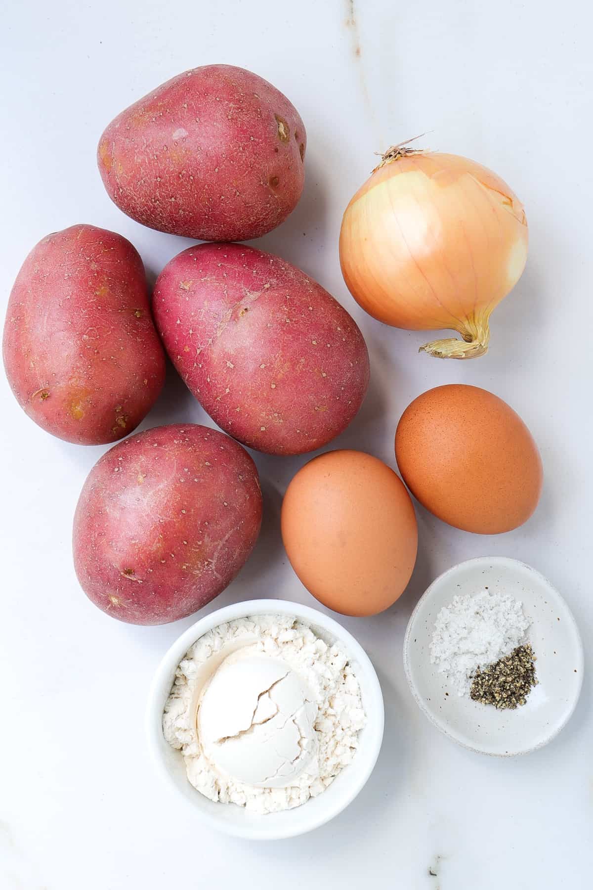 Ingredients shown to make air fryer potato fritters.