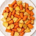 Air fryer potatoes and carrots on a plate.