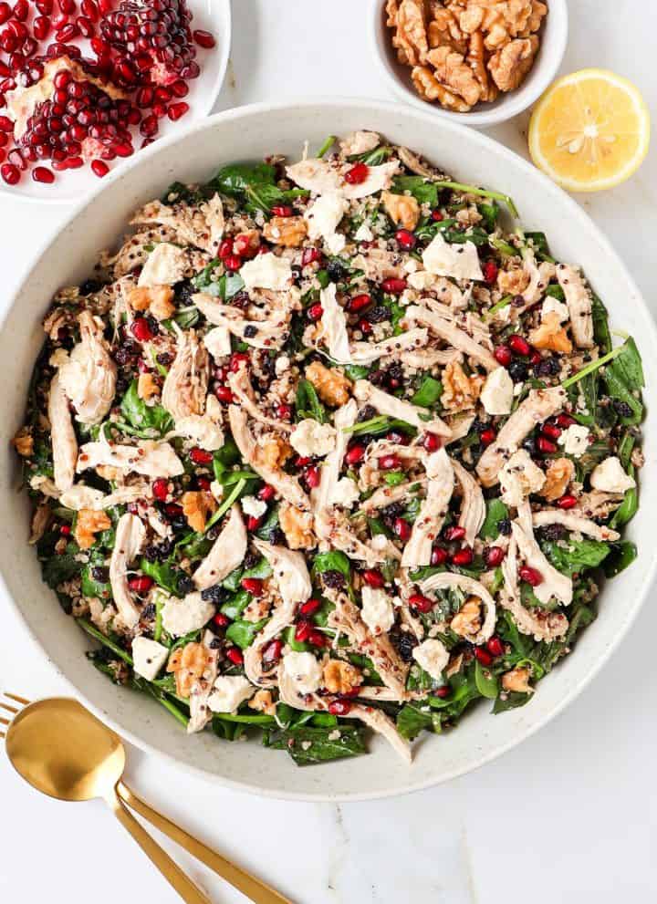 Chicken pomegranate salad in a bowl.