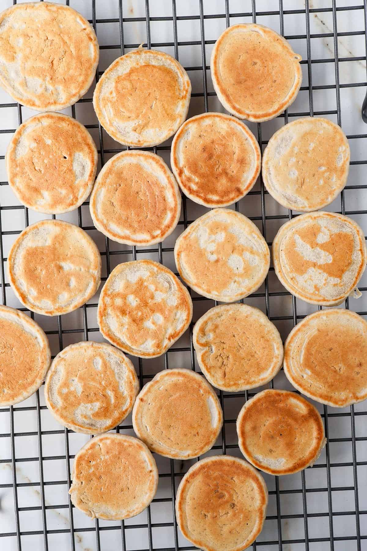 Blinis on a cooling rack.