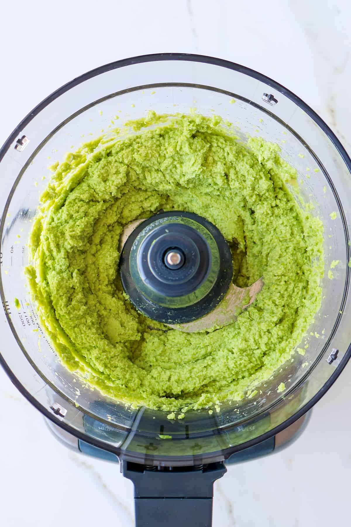 Blended edamame and avocado in a food processor.
