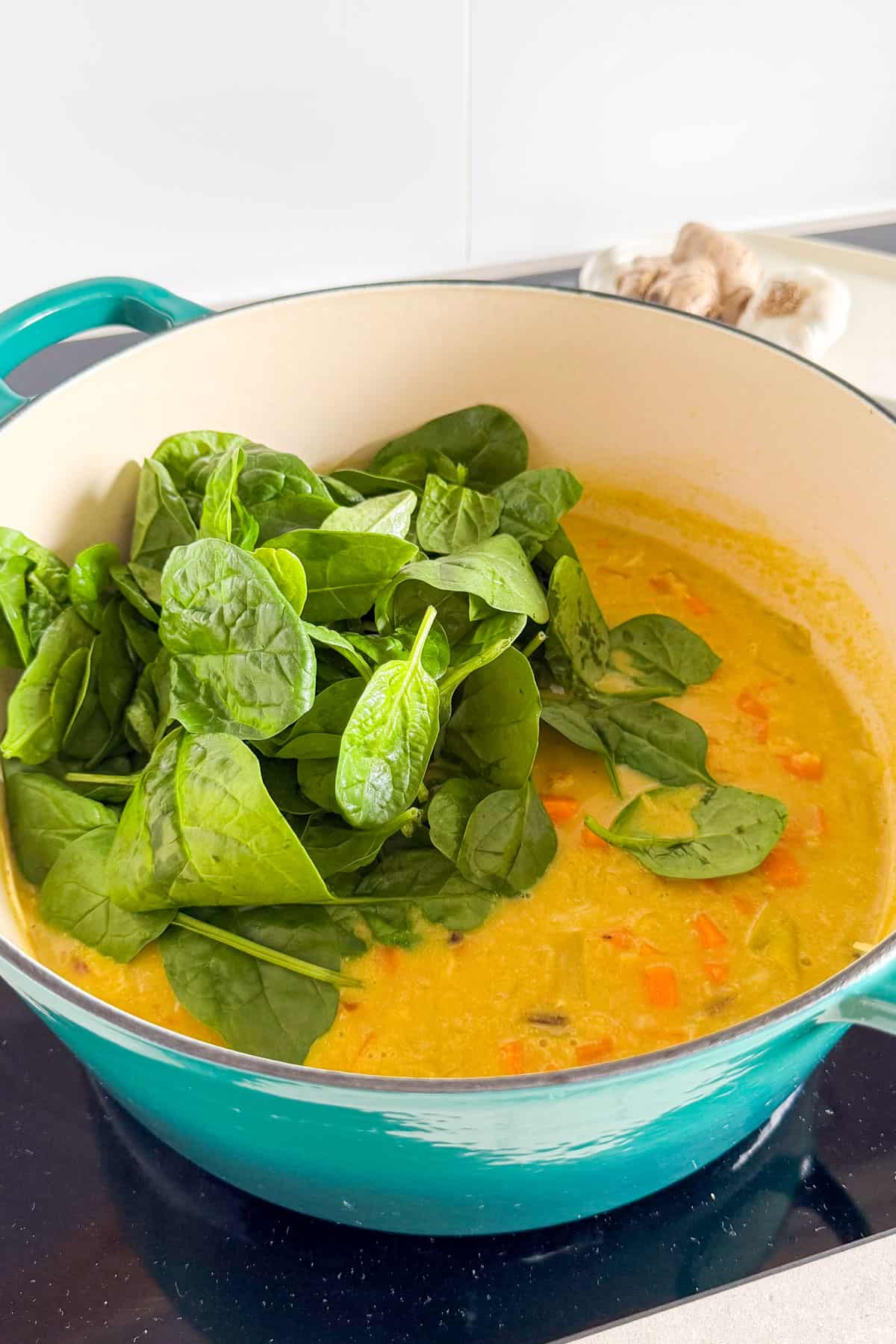 Baby spinach added to the soup.