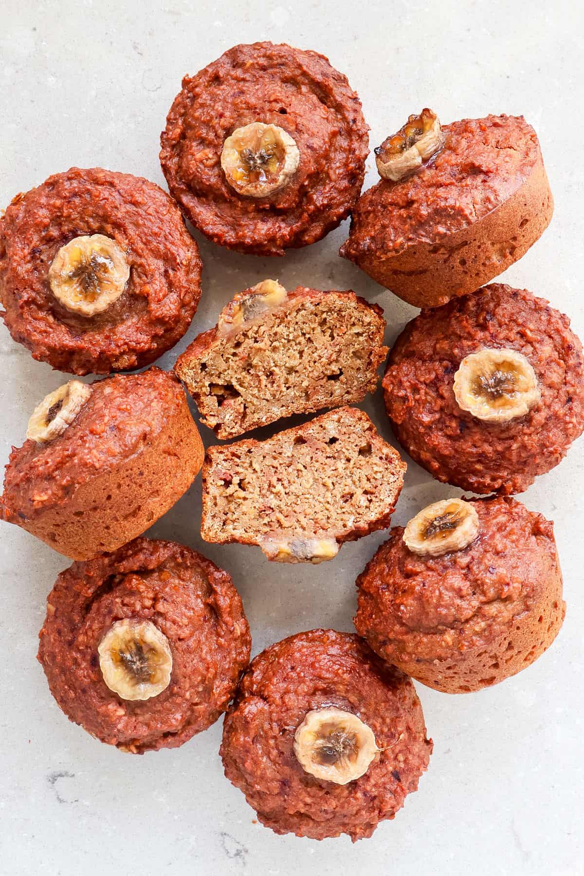 Top view of muffins and one cut in half.