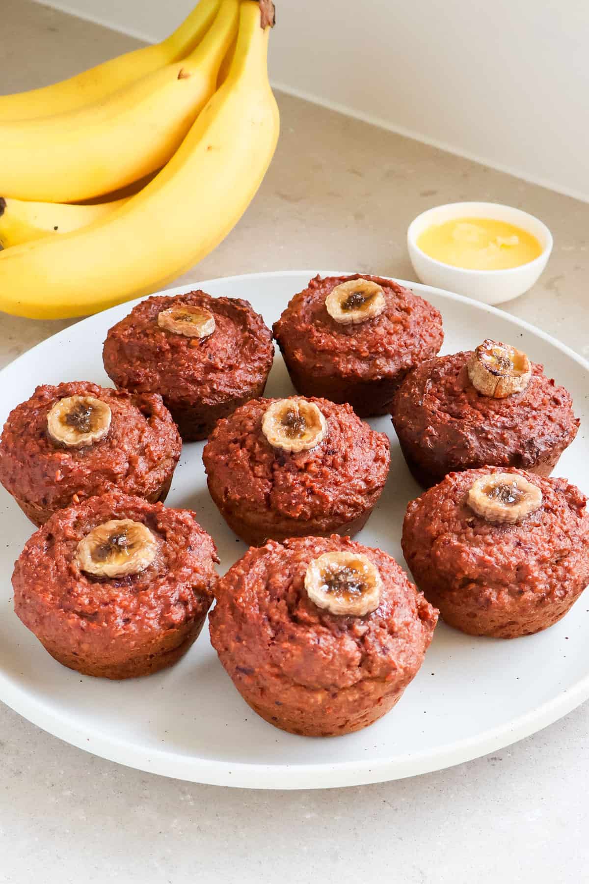 Beetroot muffins on a plate.