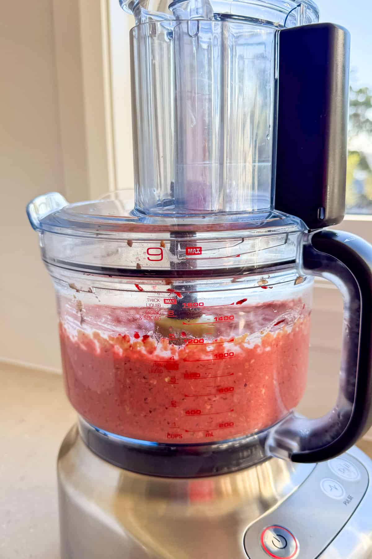 Blended beetroot batter in a food processor.