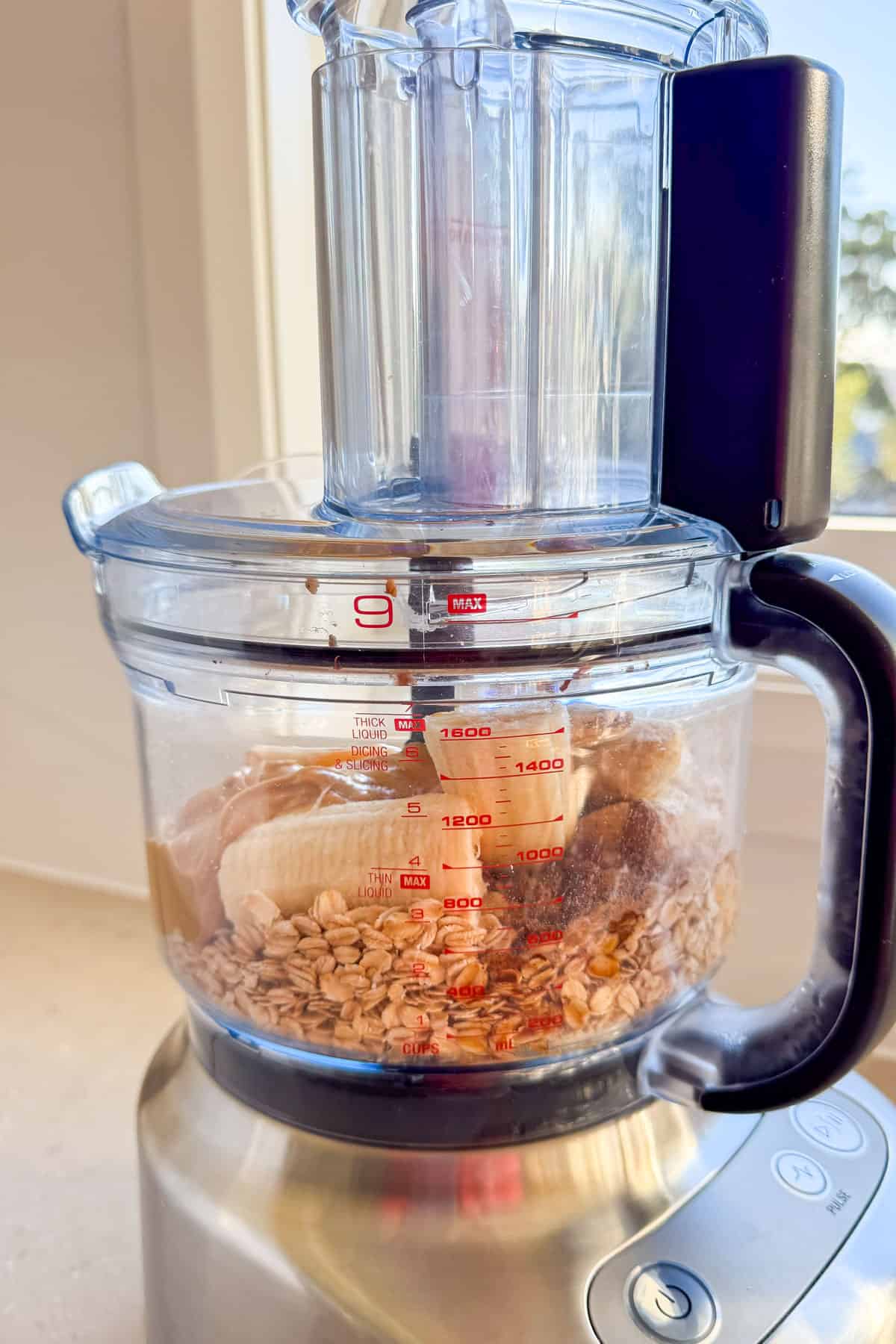 Raw ingredients added to a food processor.