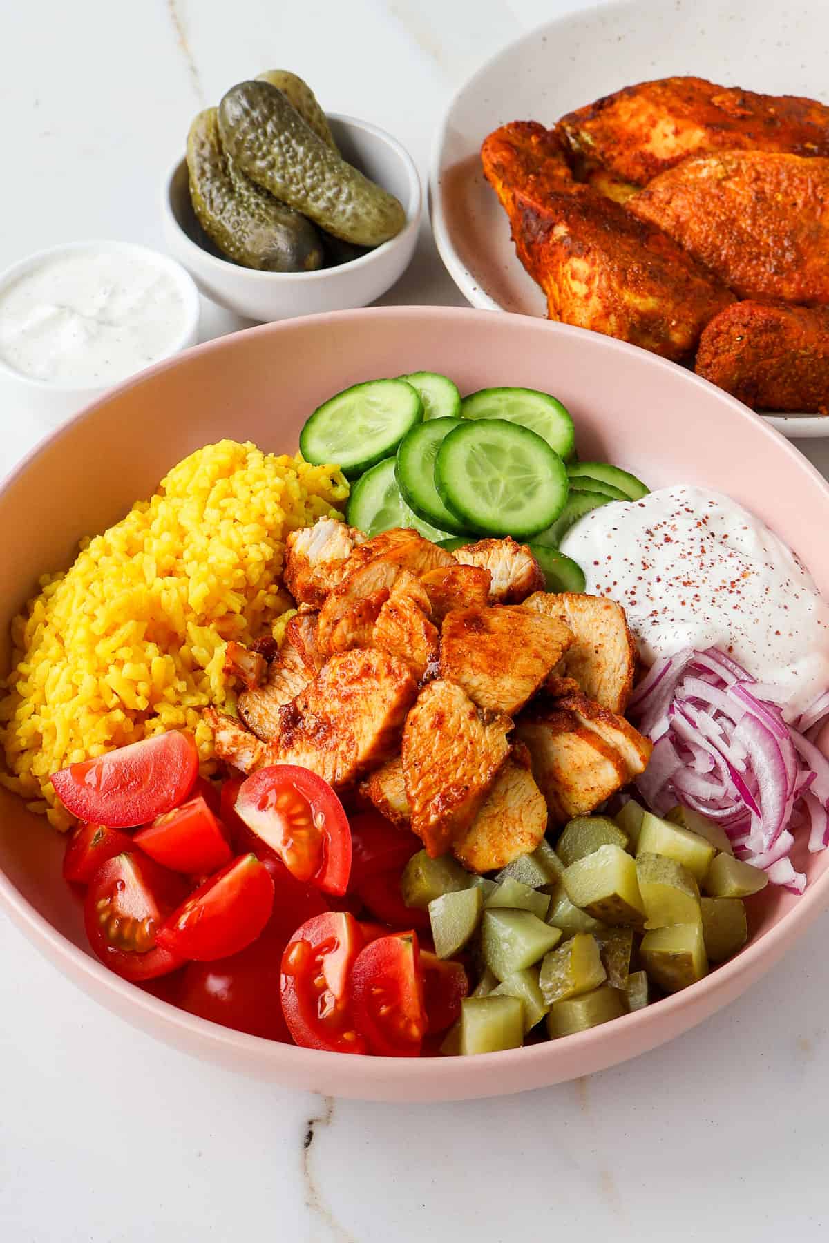 Side shot of chicken shawarma bowls.