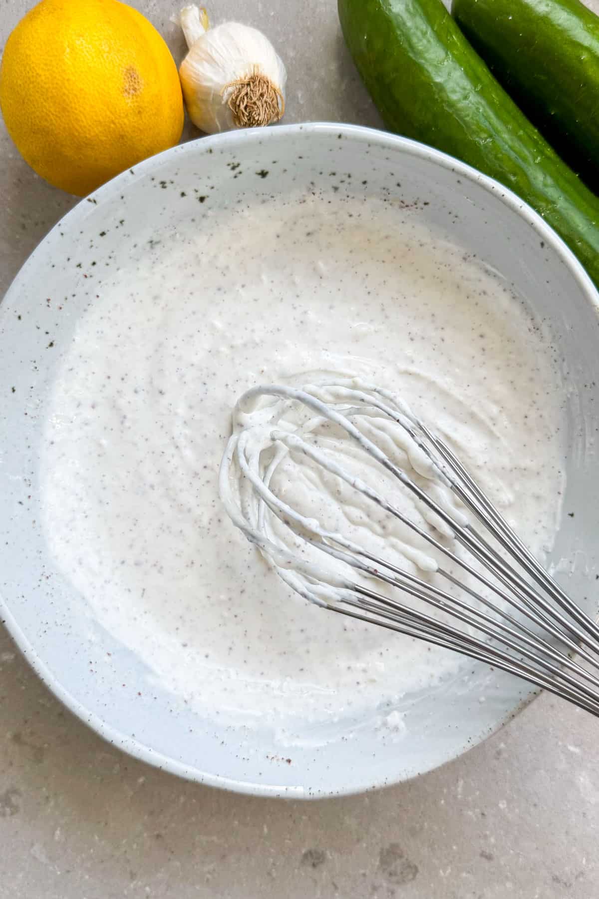 Sumac yoghurt sauce in a bowl.
