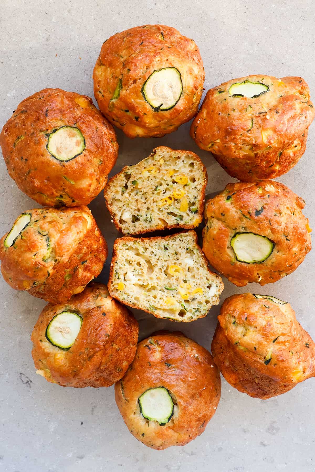 Top view of muffins and one cut in half.