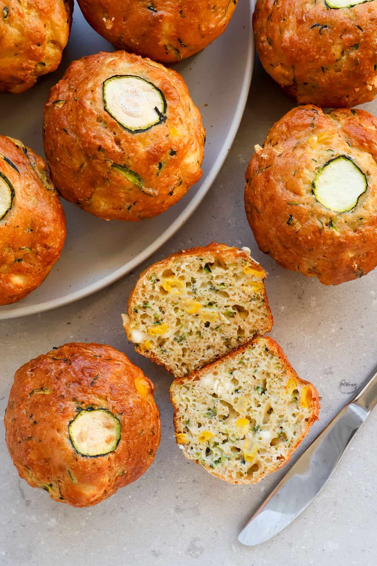 Close up shot of a zucchini muffin cut in half.