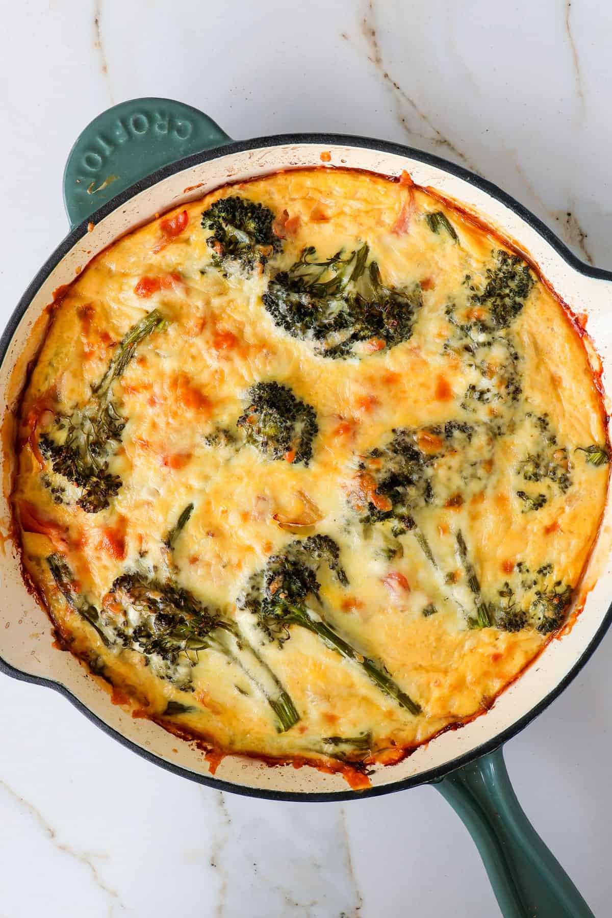 Broccolini frittata in a skillet.