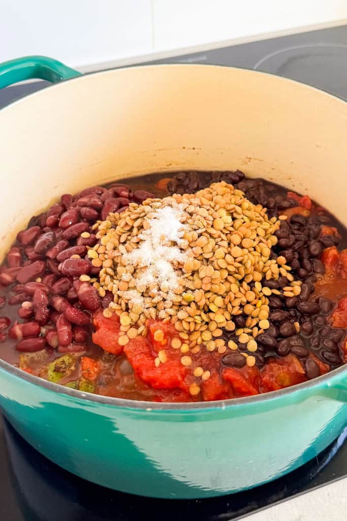 Lentils and beans added to the pot.