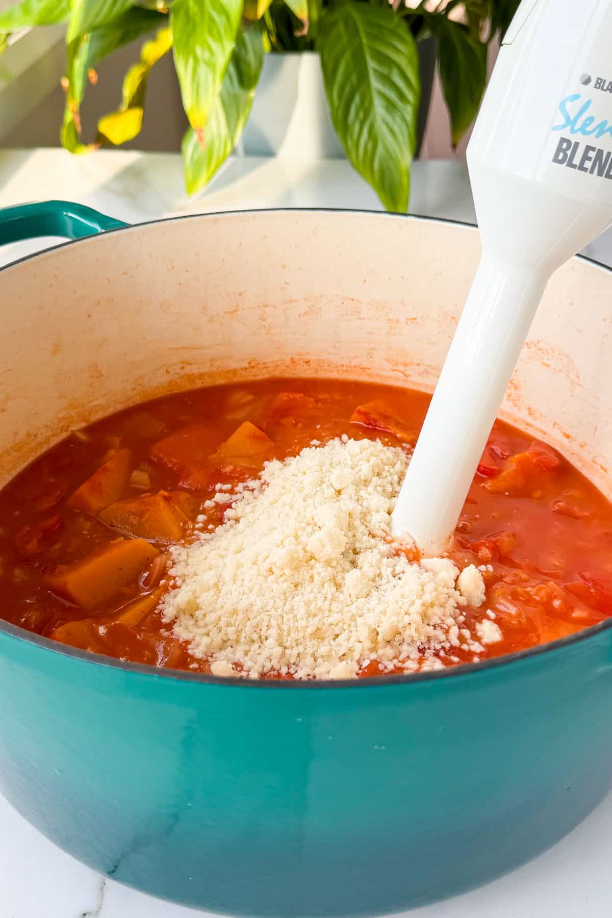 Soup being blended in the pot.