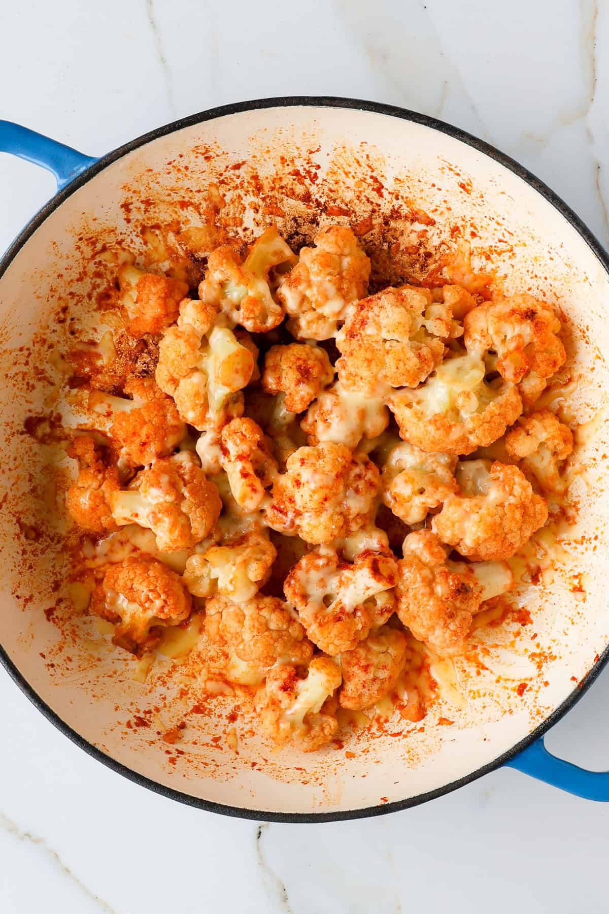 Sautéed cauliflower in a pan.