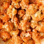 Close up of the cheesy cauliflower in a pan.