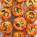Cauliflower corn muffins on a cooling rack.