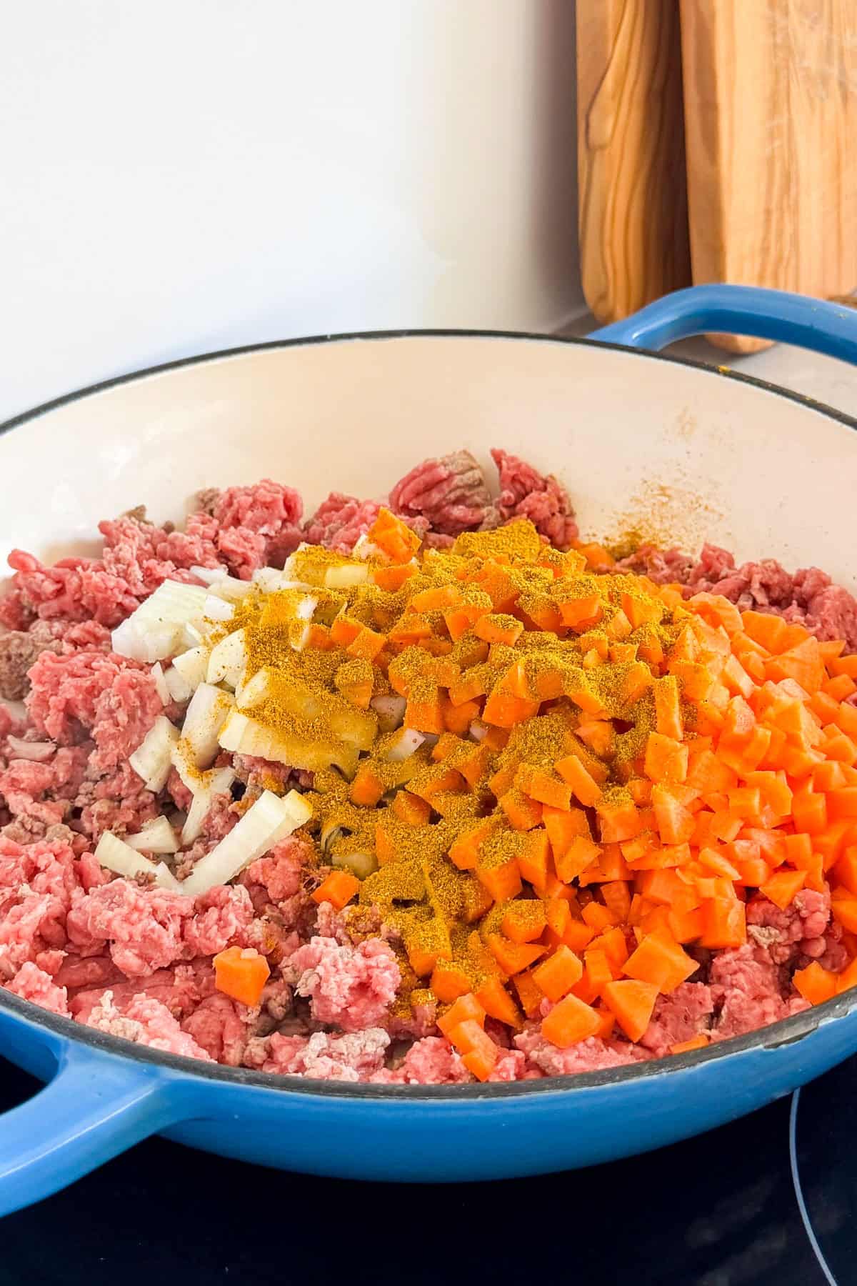 Carrots, onions and curry powder added to the meat.