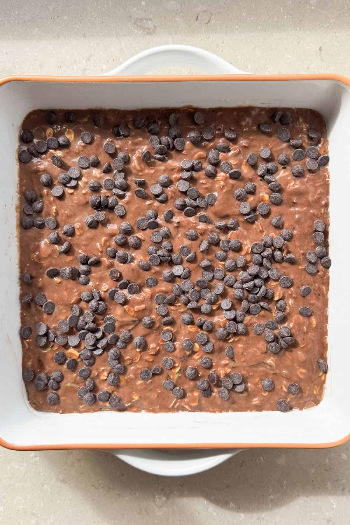 Chocolate chips added on top of the oatmeal.